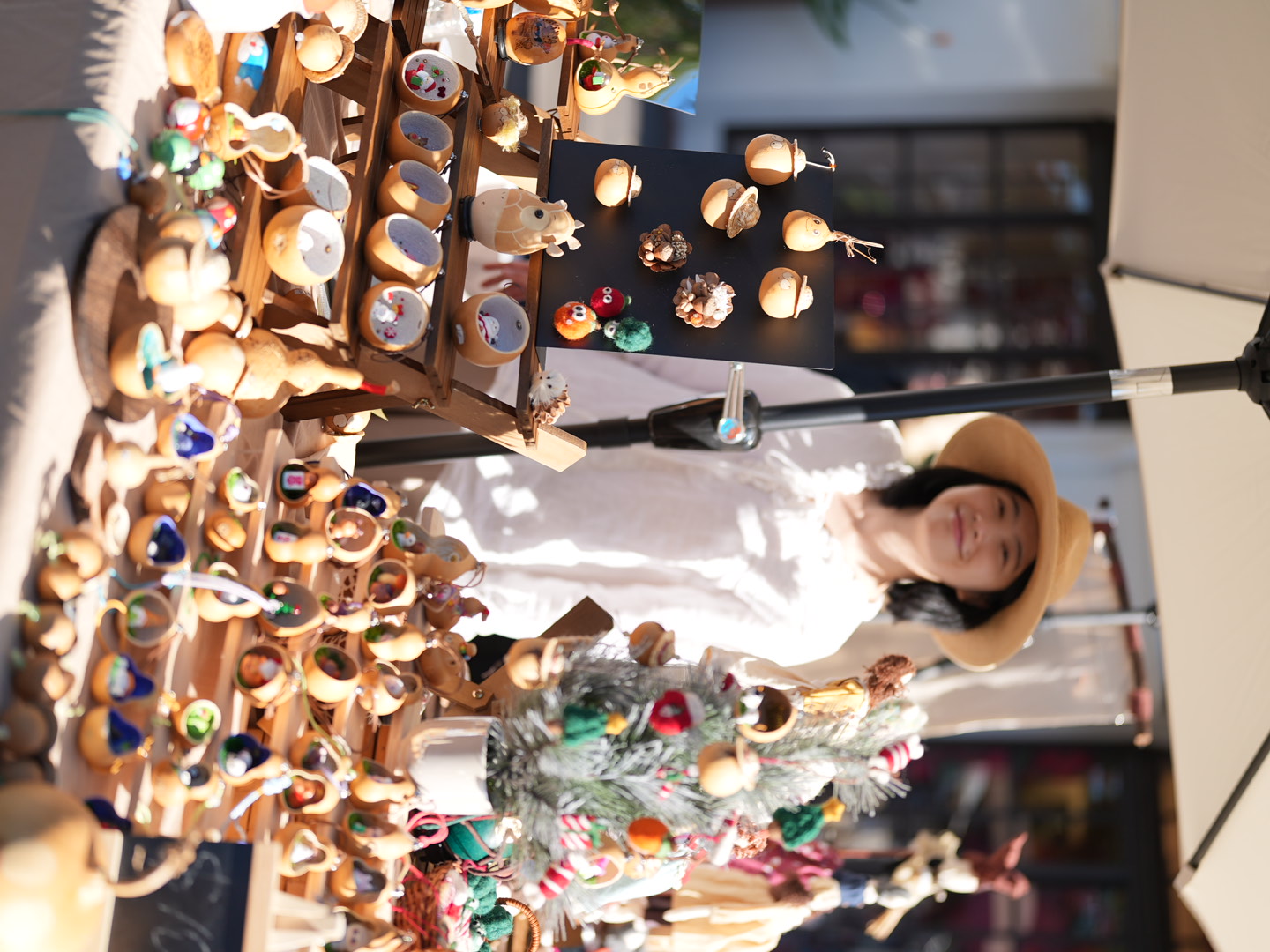 HULULU GARDEN daytime market booth with handcrafted gourd art