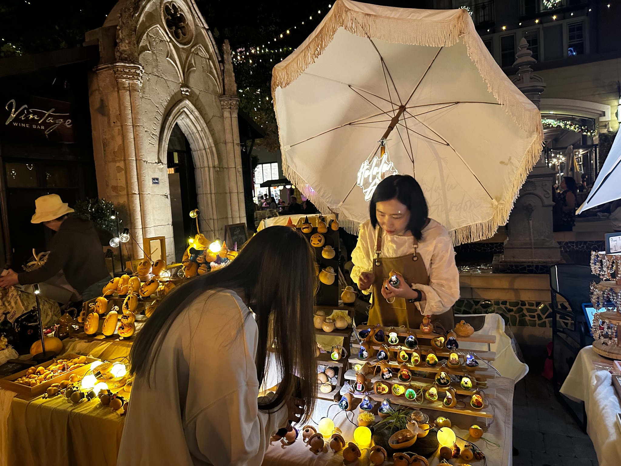 Small gourds carved open with tiny characters inside